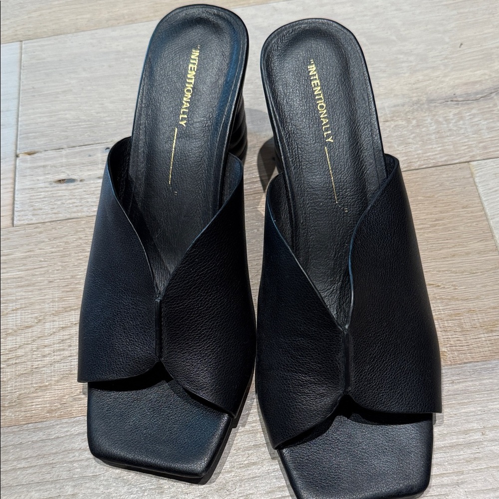 INTENTIONALLY BLANK Black Leather Mules